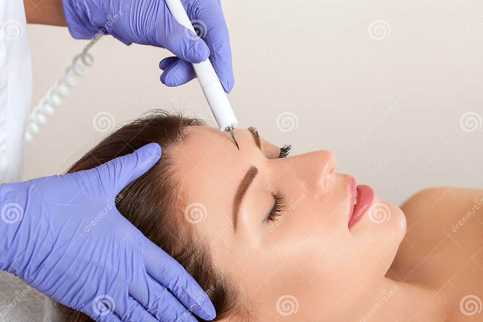 The Doctor Cosmetologist Makes The Procedure Treatment Of Couperose Of