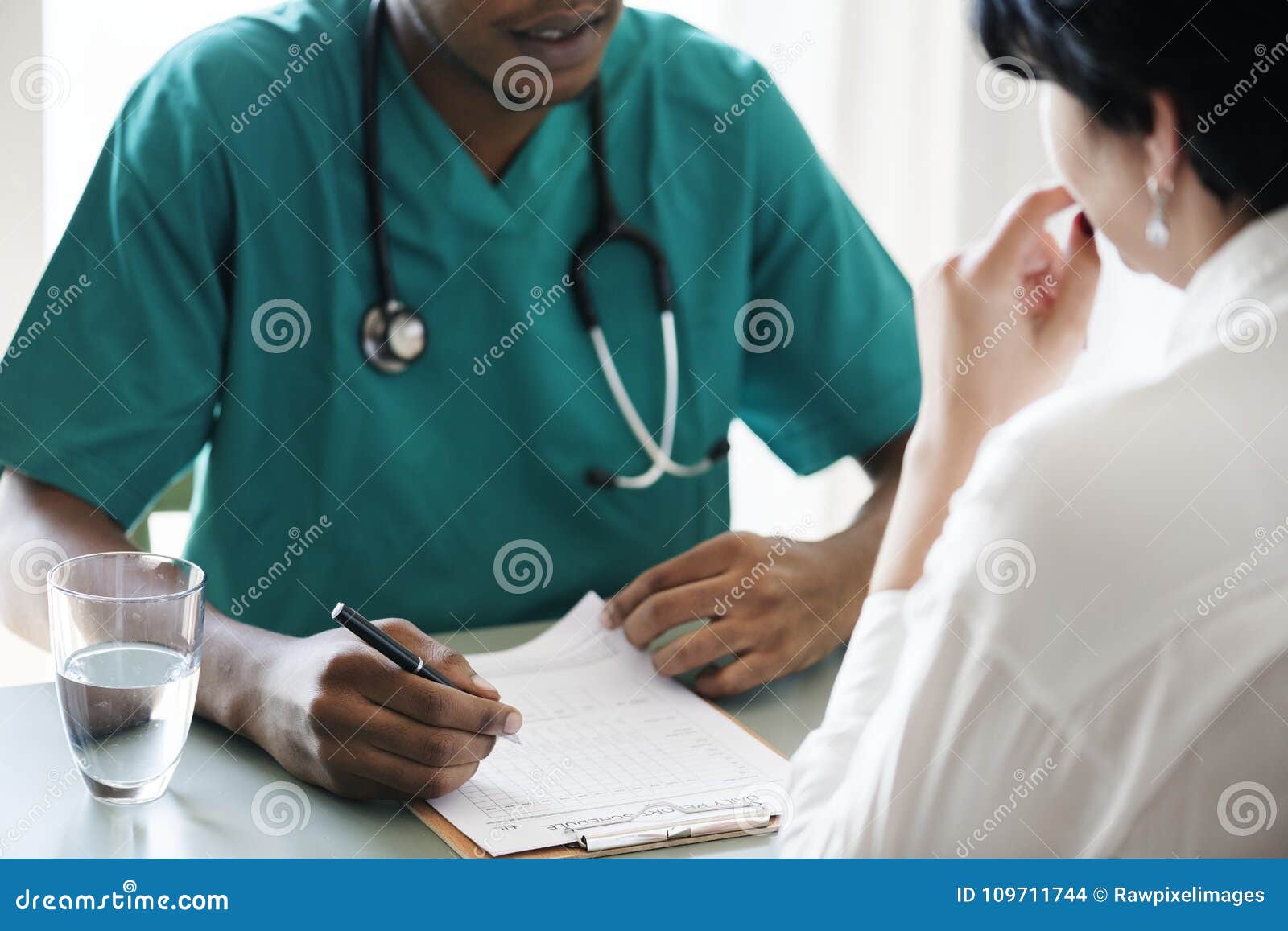 doctor diagnose patient symptoms at the hospital