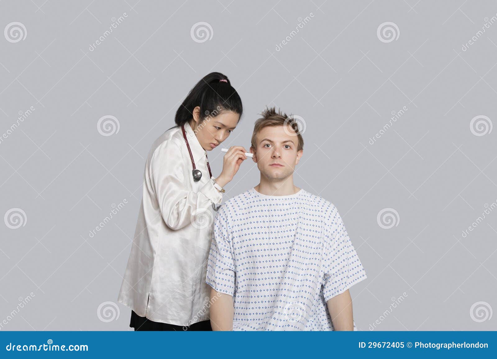 Doctor Examining Patient S Ear with Flashlight Stock Image Image of