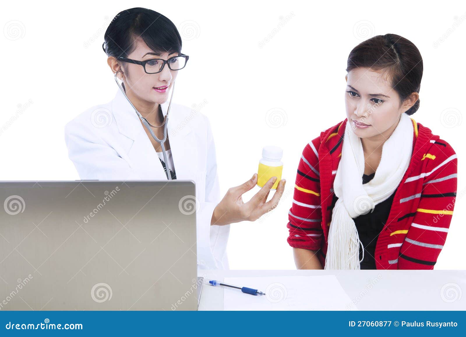 doctor explaining medicine dosage to patient