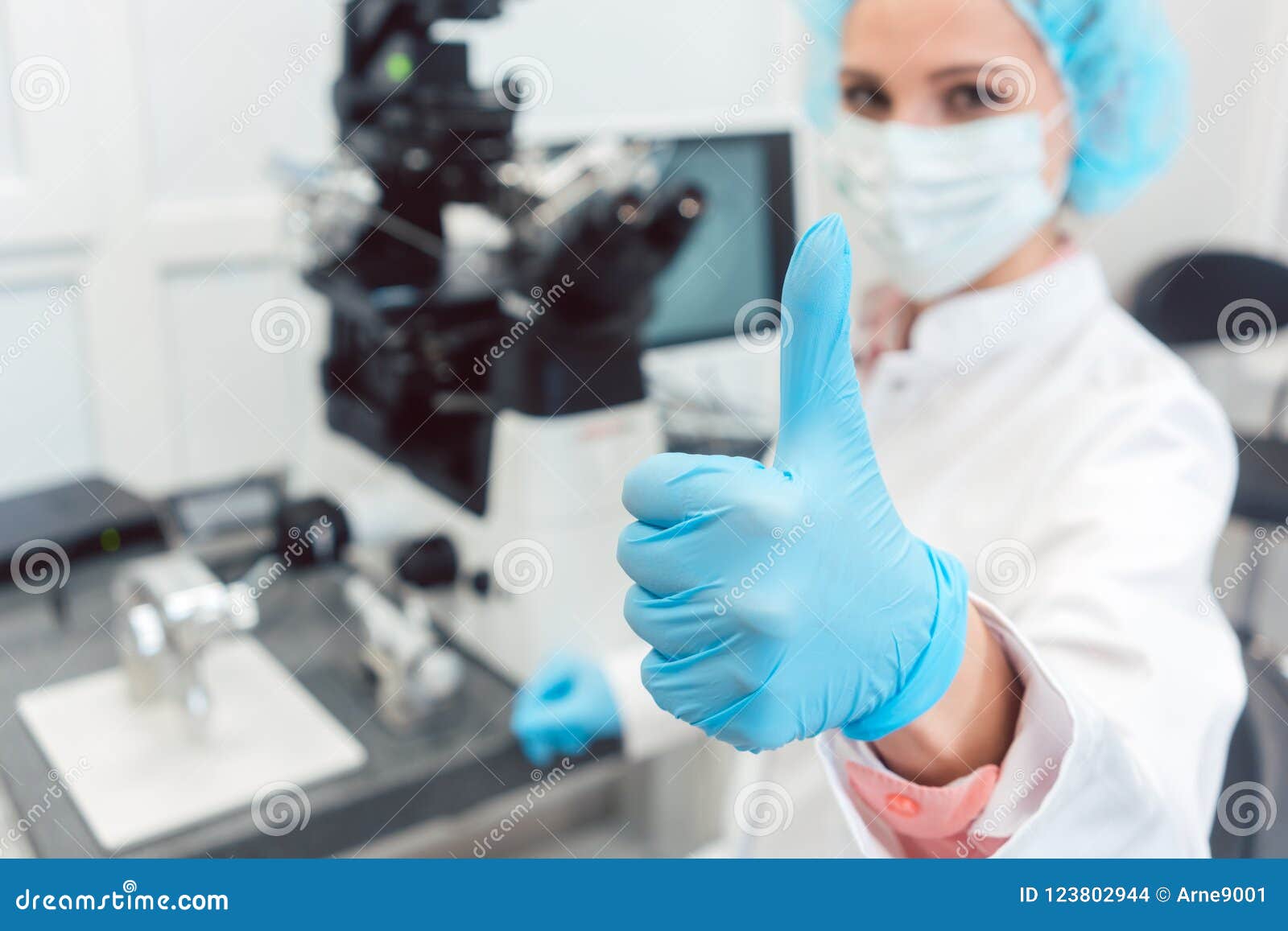 doctor in fertility lab having just fertilized a human egg