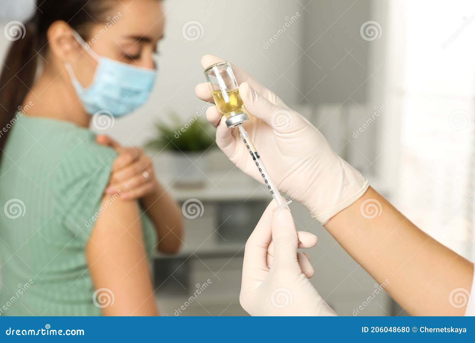 Doctor Giving Injection To Patient In Hospital Closeup Vaccination