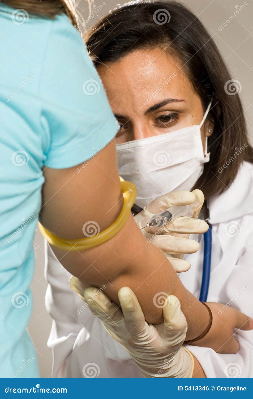 Doctor Giving a Shot in the Arm Vertical Stock Photo Image of people