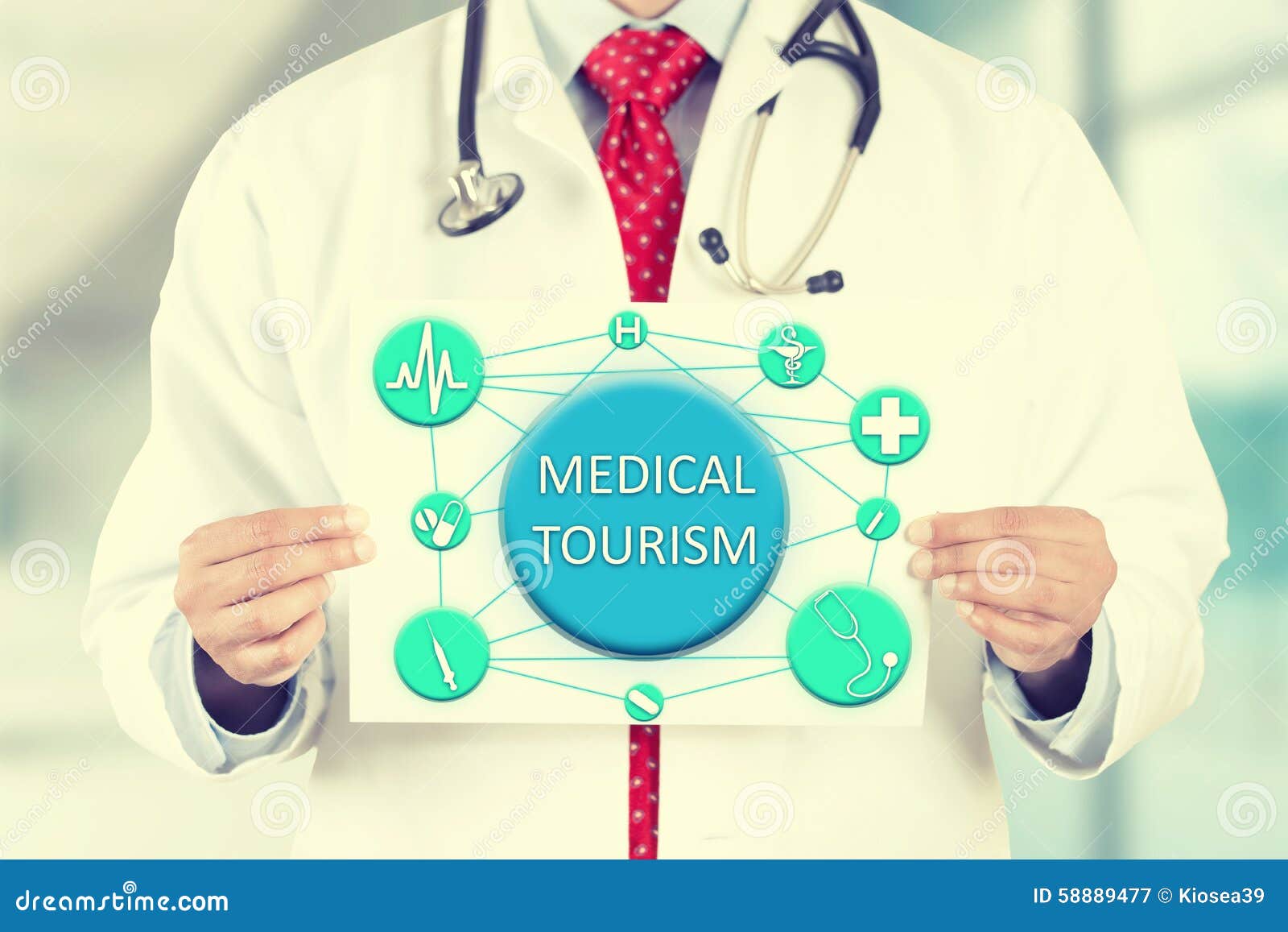 doctor hands holding card sign with medical tourism message