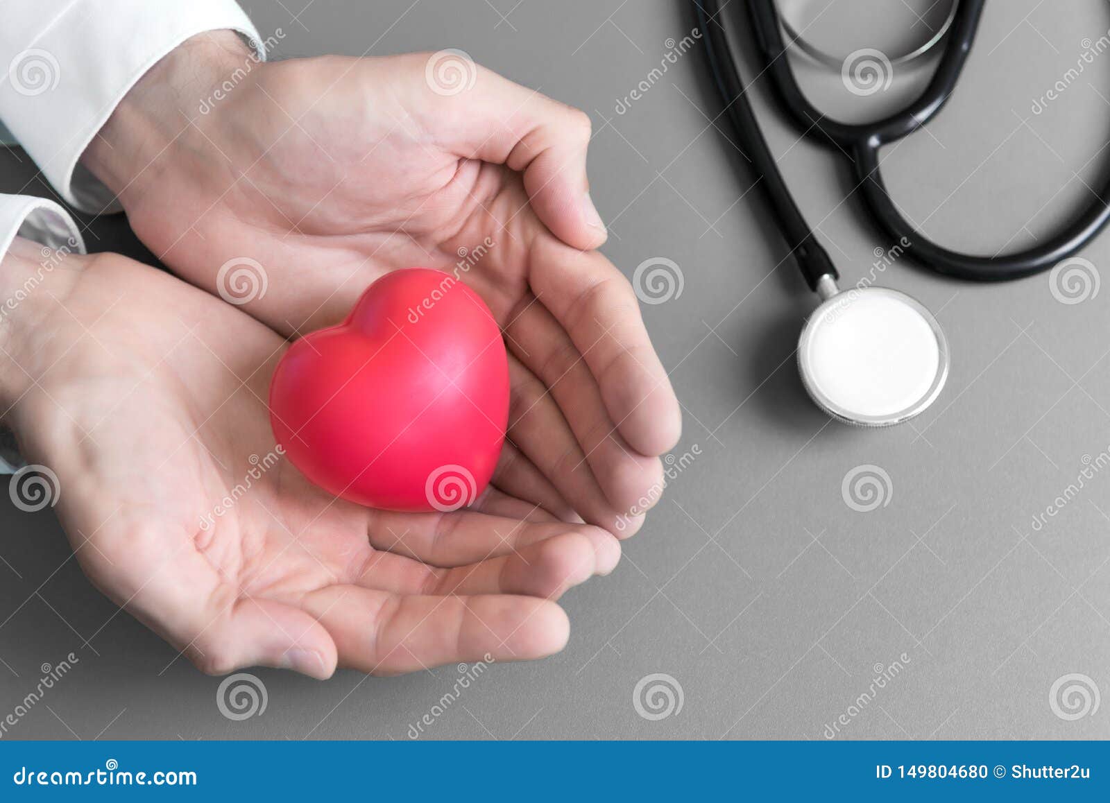 doctor hands holding and give red massage heart to patient for recover from sickness. hospital and healthcare concept. cpr and