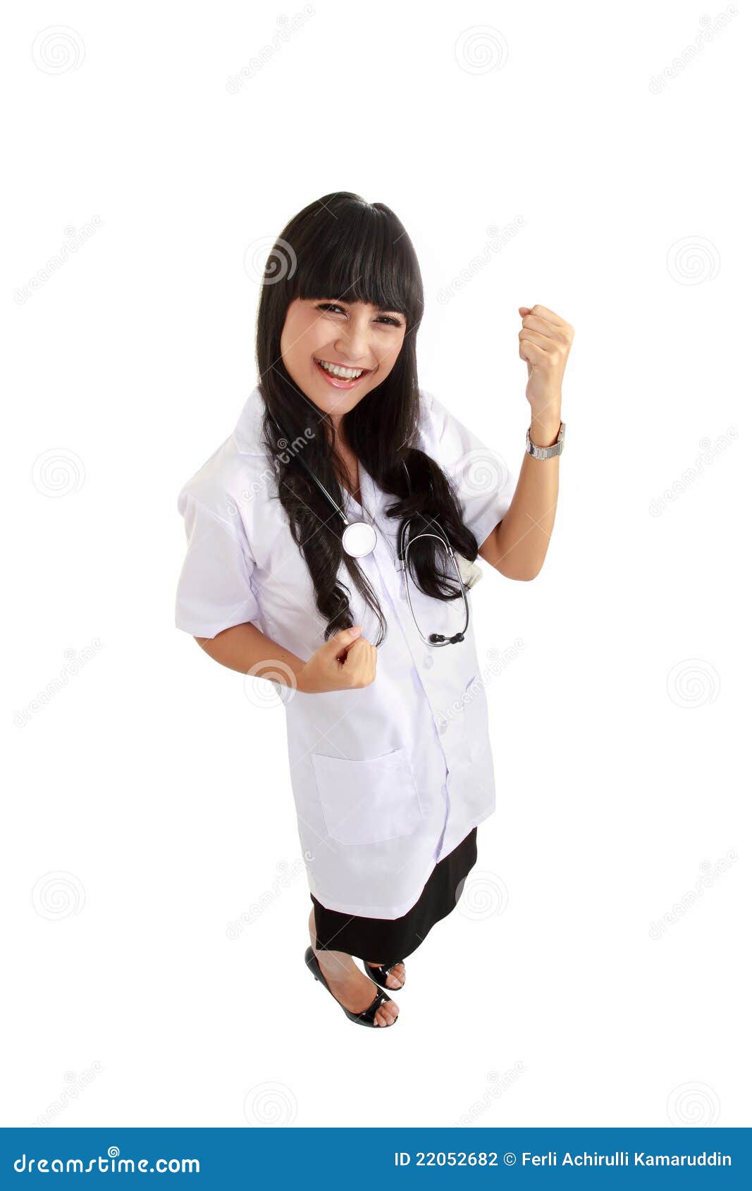 Doctor happy excited and joyful. Cheerful young woman doctor isolated on white background.