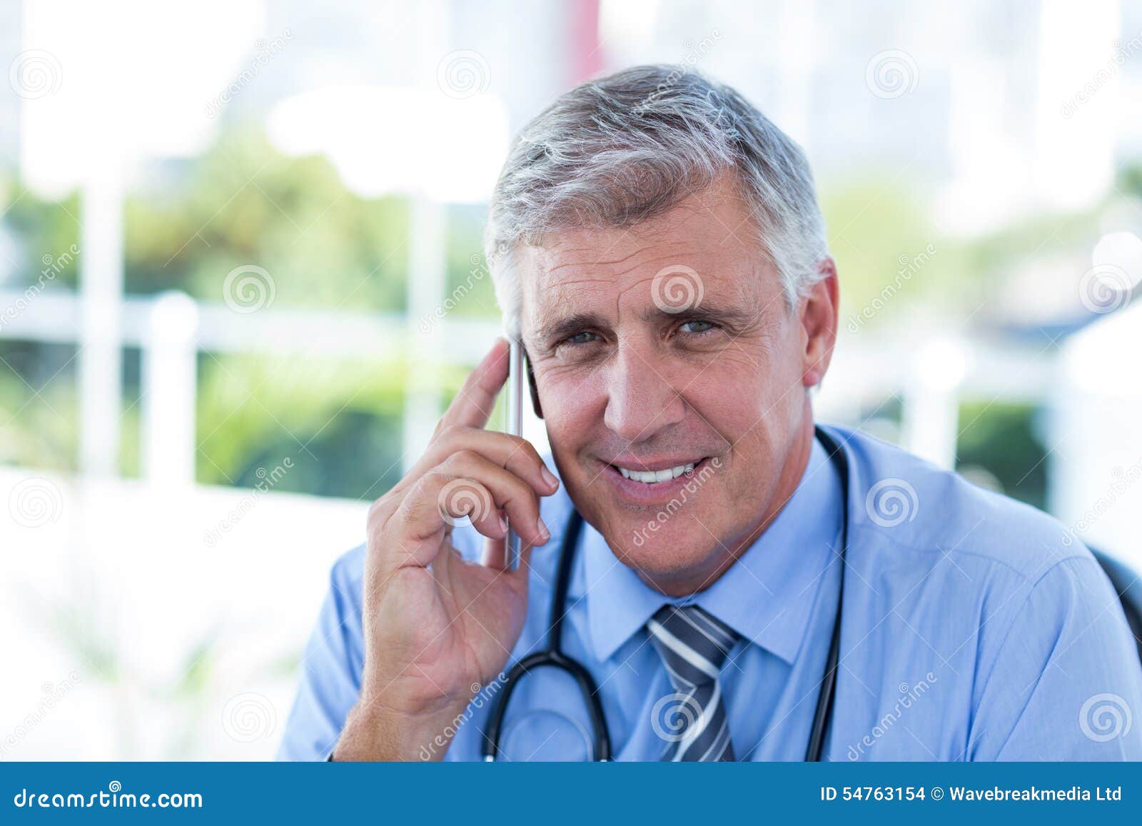Doctor having phone call stock photo. Image of person 54763154