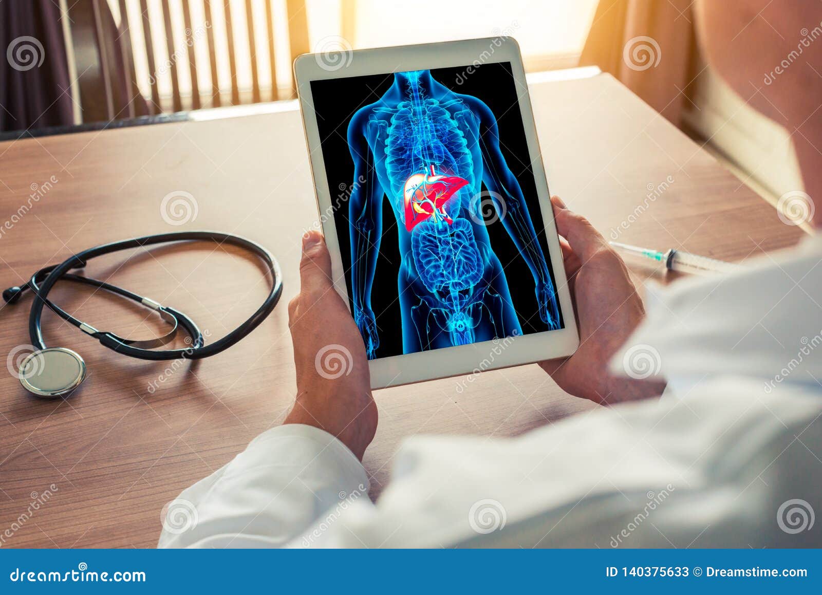 Doctor Holding A Digital Tablet With X Ray Of Body Skeleton With