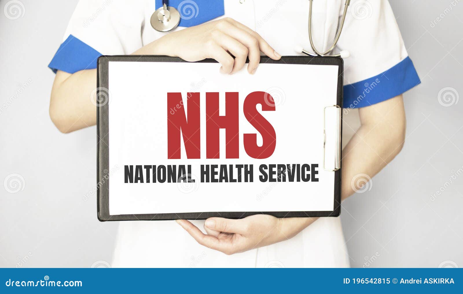 doctor holding a paper plate with text nhs, medical concept