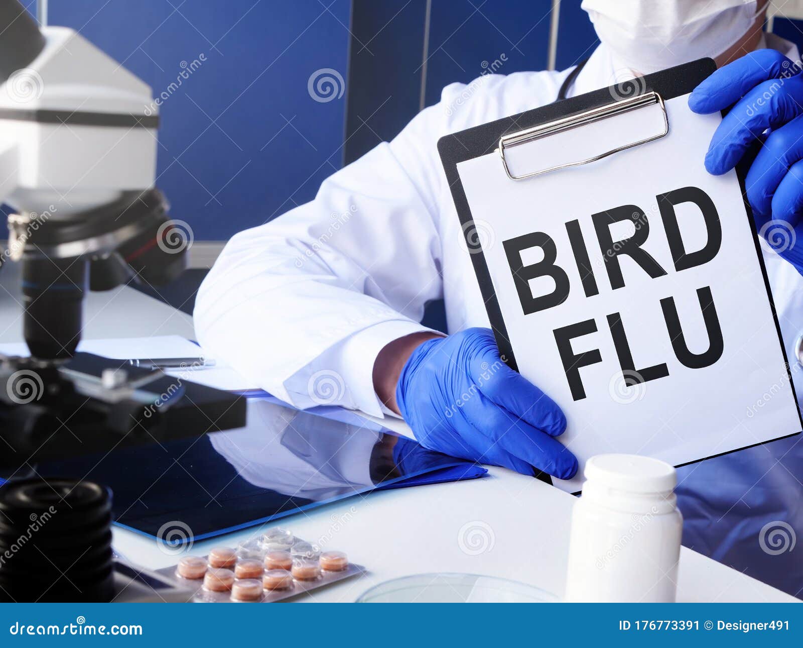 doctor holds bird flu diagnosis in the clinic
