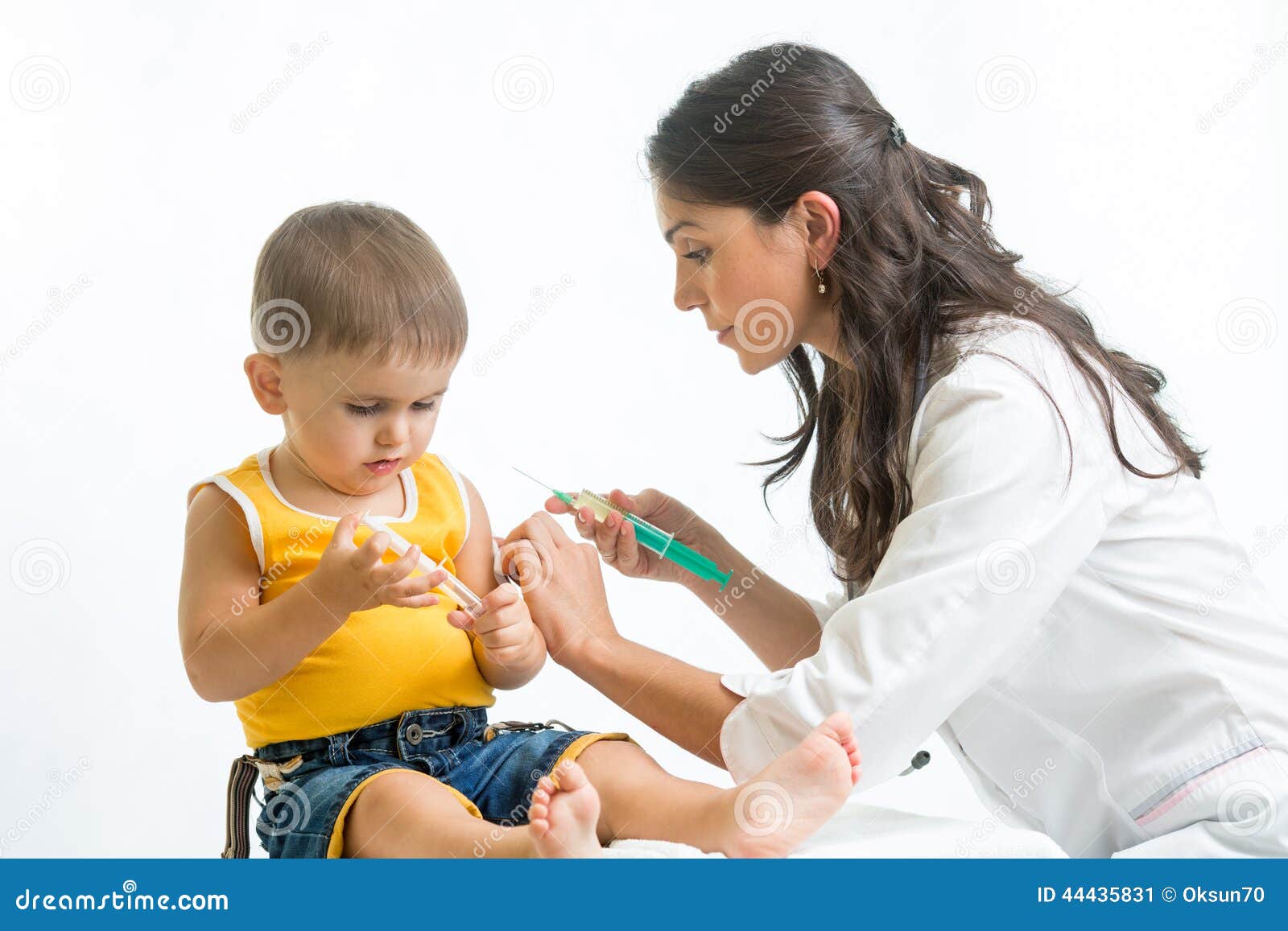 doctor injecting baby