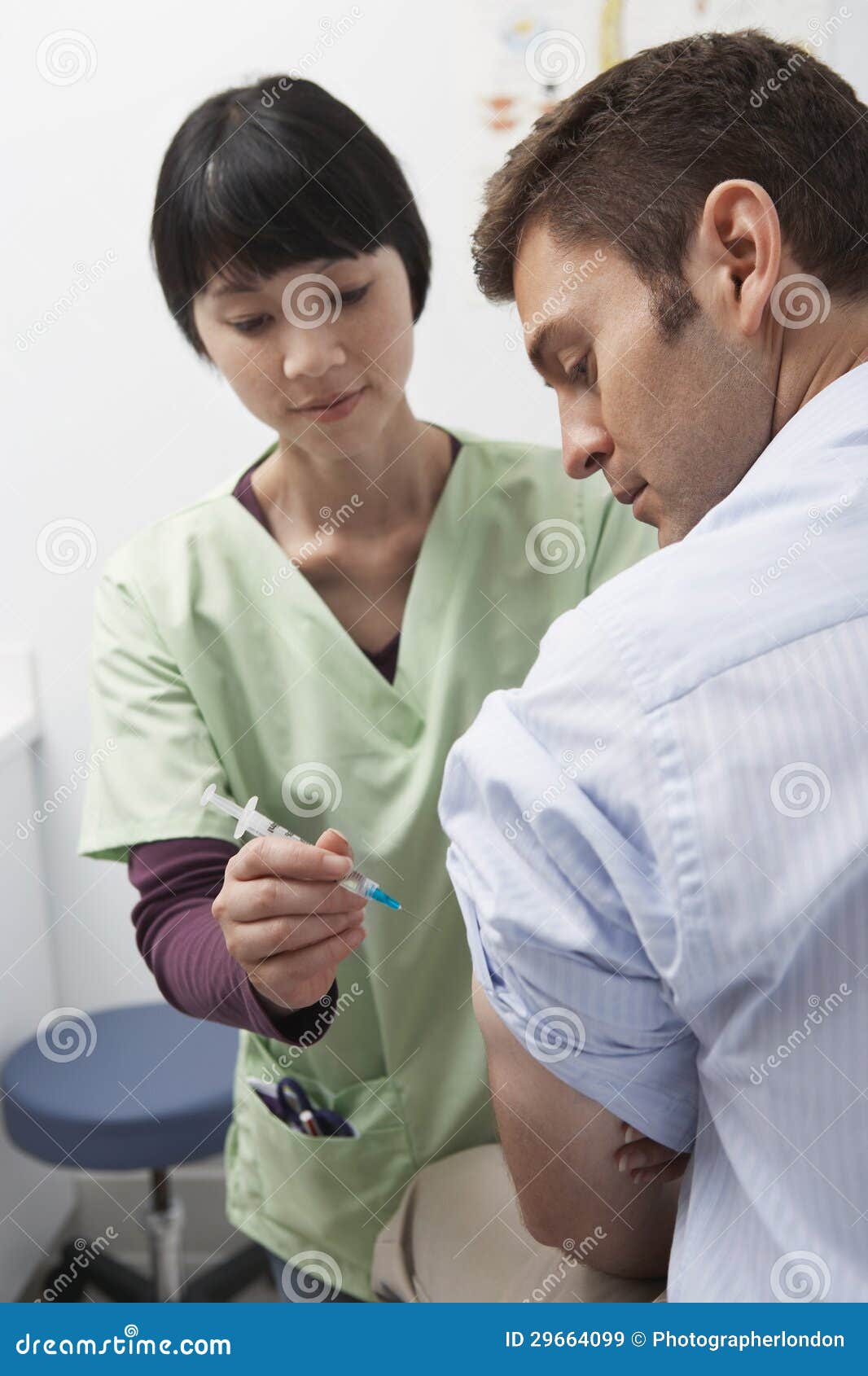 doctor injecting patient