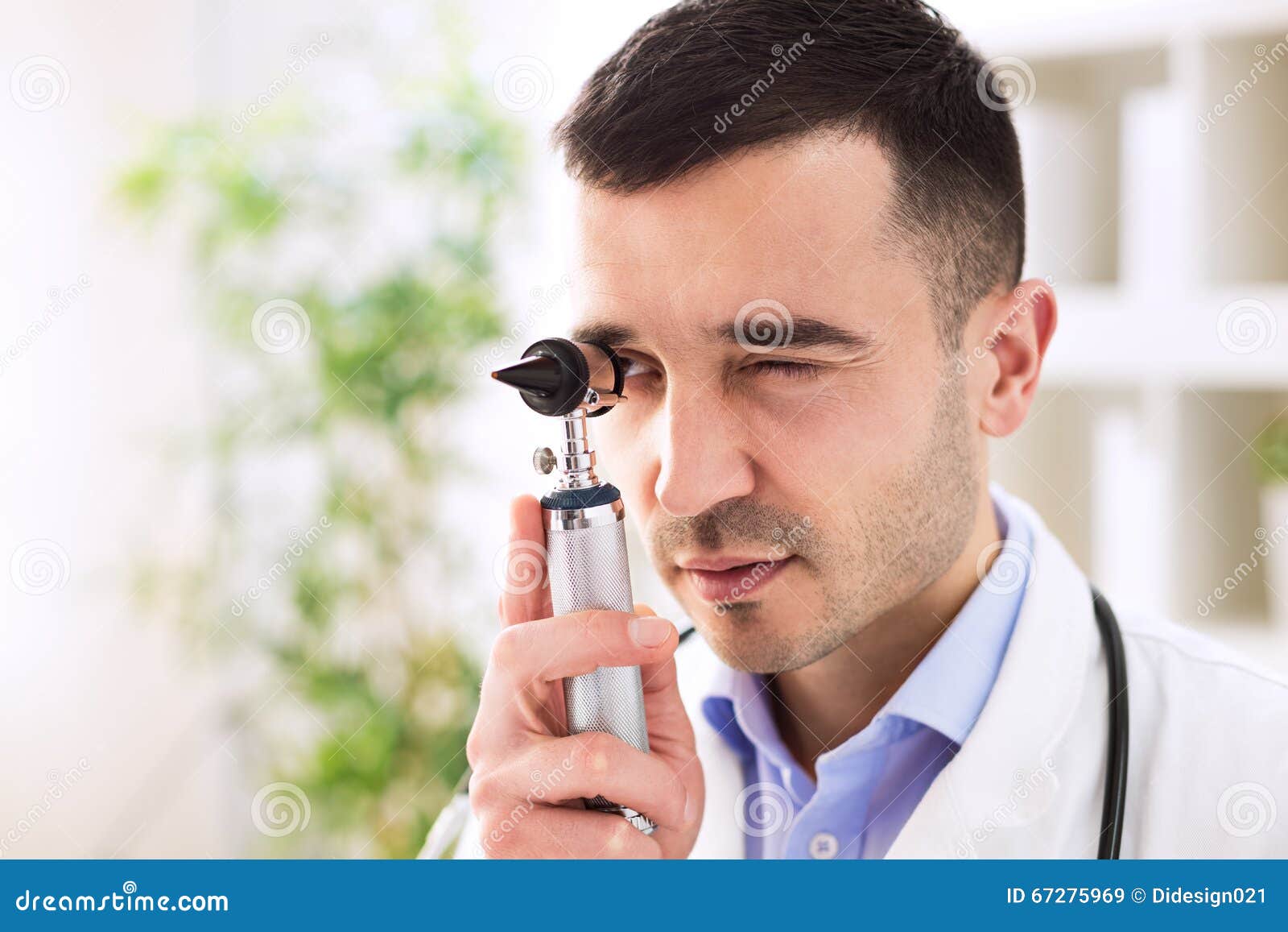 Doctor Looking through Otoscope Stock Image Image of otologist