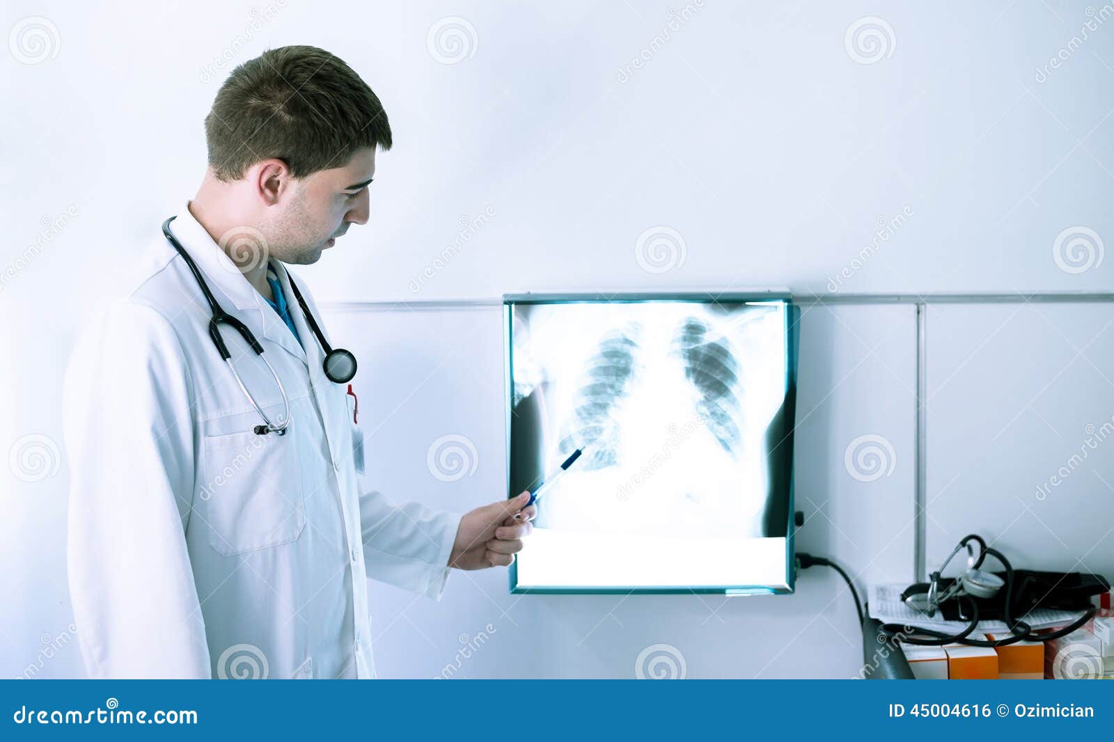 Doctor at lung Xray stock photo. Image of looking, chest 45004616