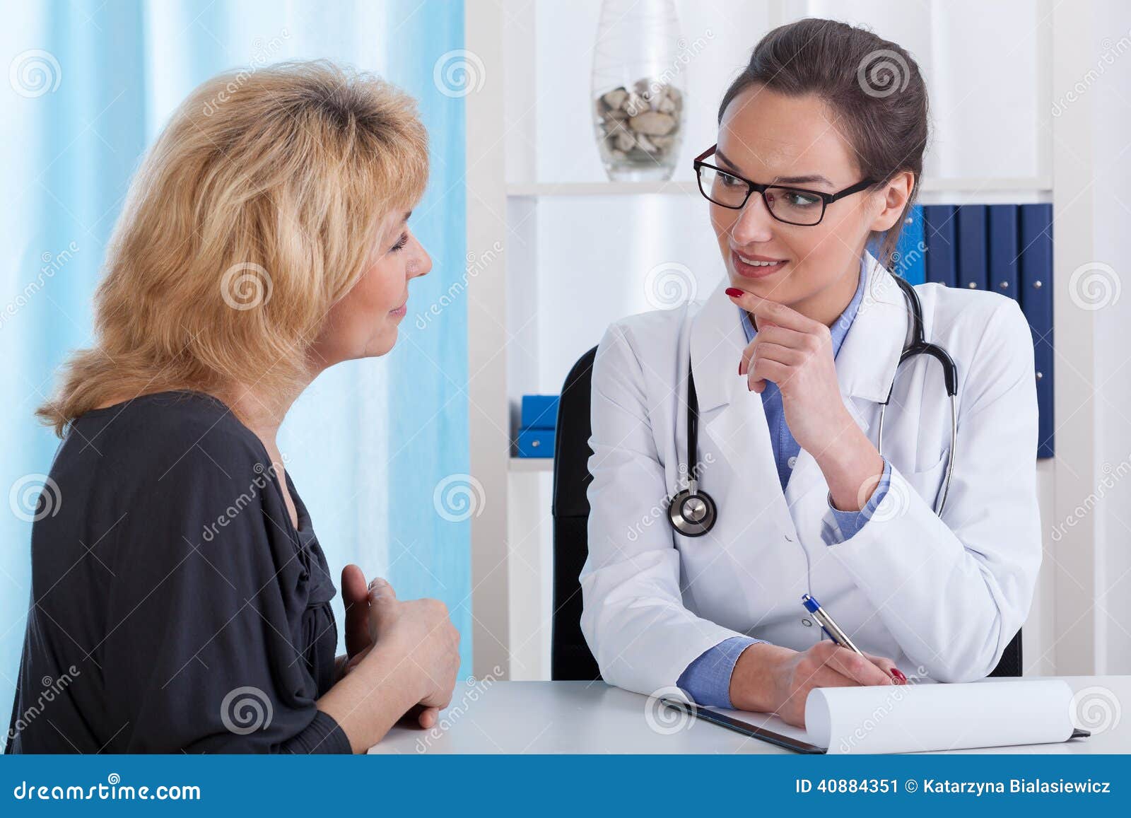 doctor and middle aged patient