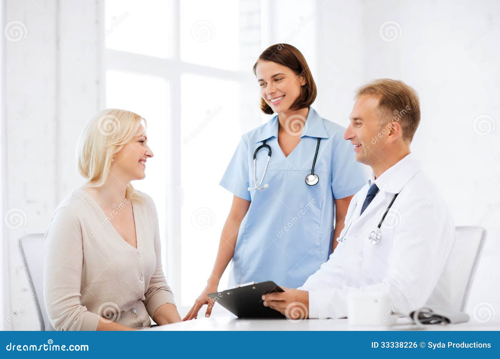 Doctor And Nurse With Patient In Hospital Royalty Free Stock Image Image 33338226