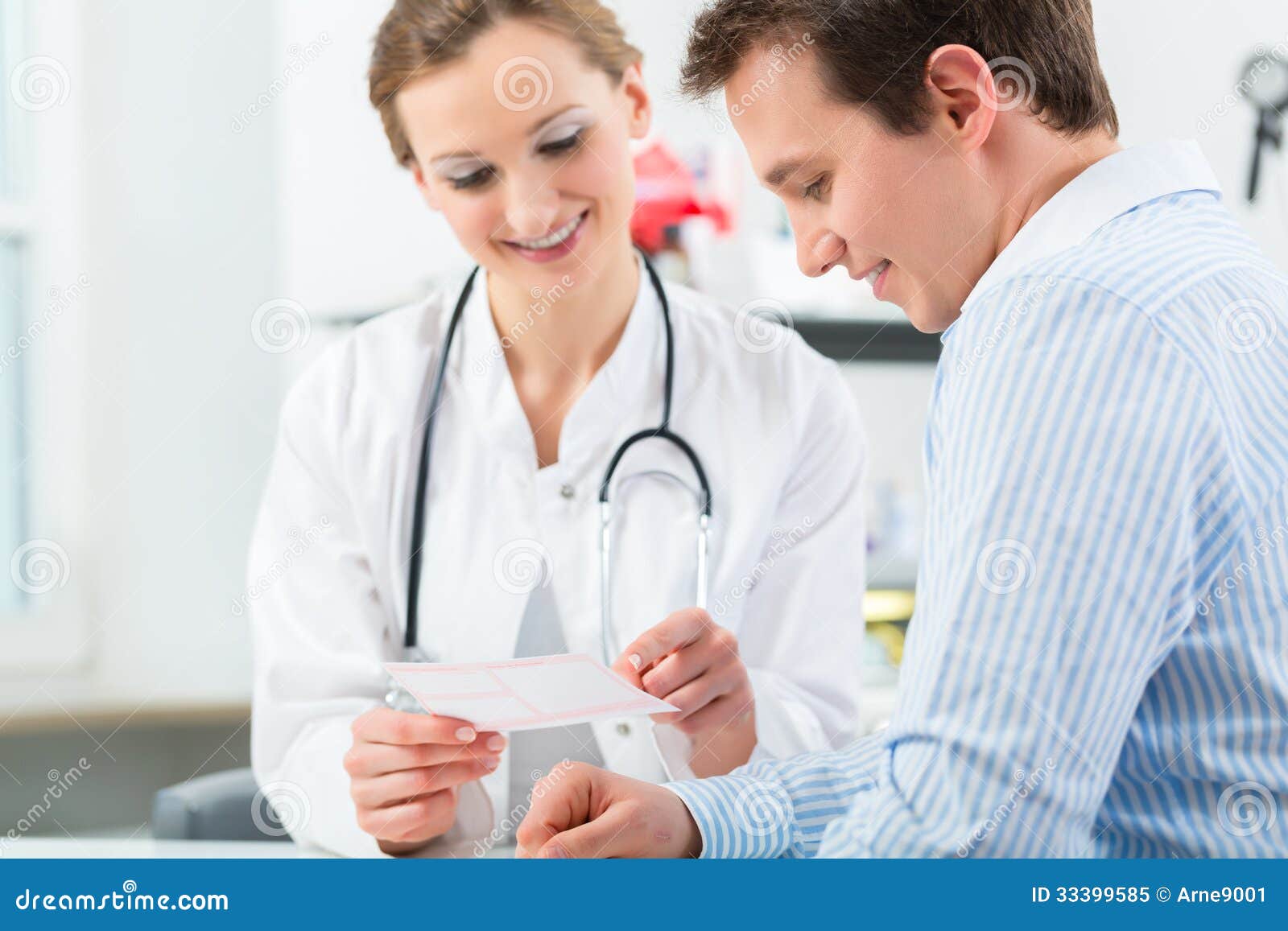 doctor with patient in clinic consulting
