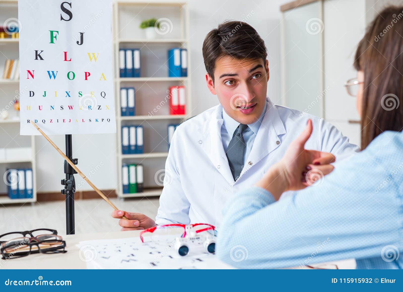 The Doctor with Patient at Eye Exam Stock Photo Image of hospital