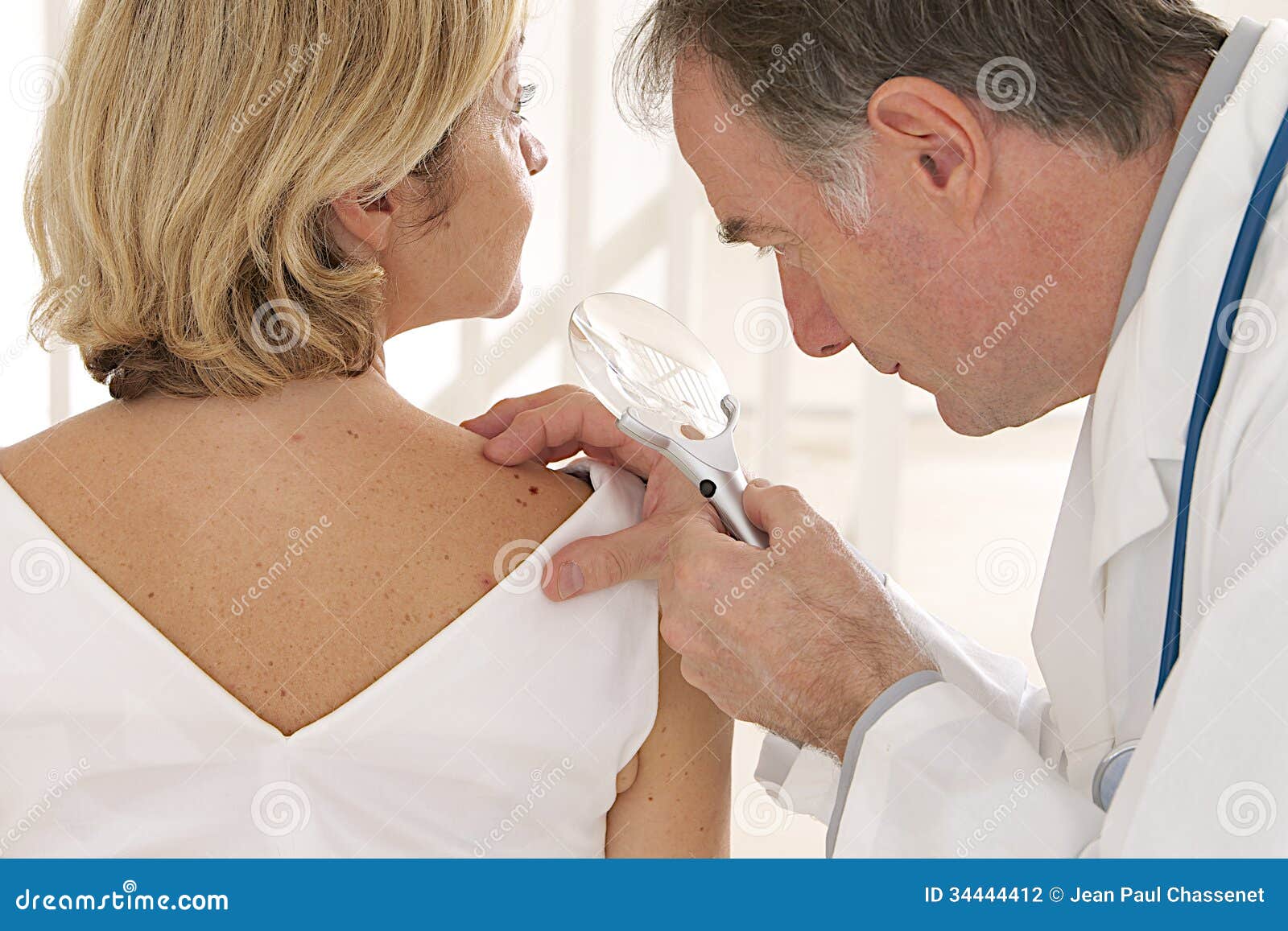 doctor and patient - - looking for skin disease