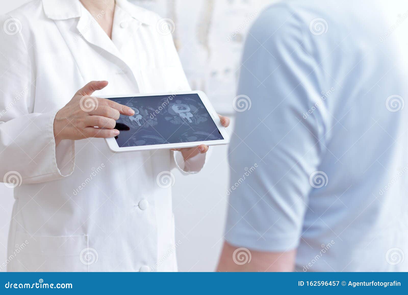 doctor patient tablet cat scan images