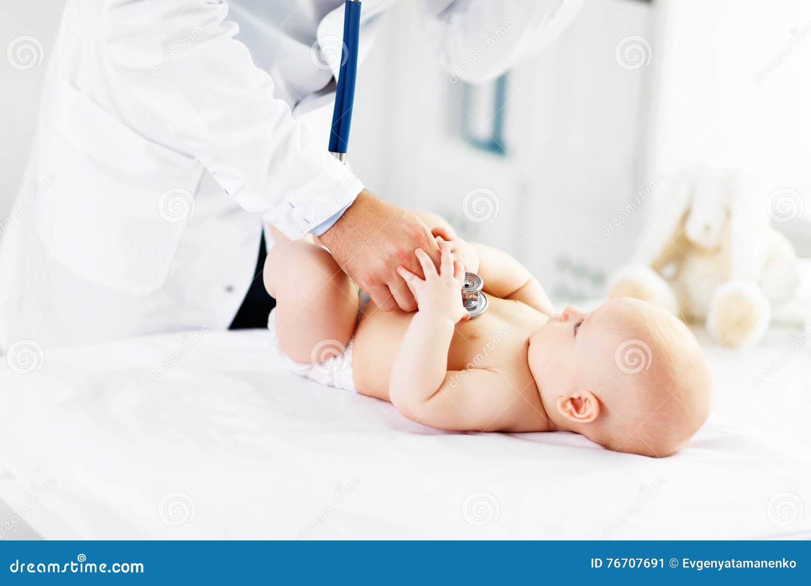 doctor pediatrician stethoscope listening to baby