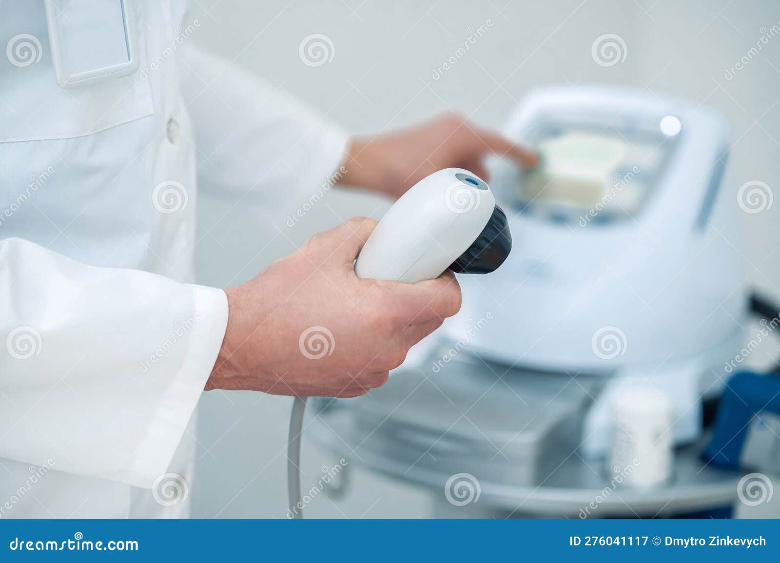 Doctor Preparing Medical Equipment for Work with the Patient Stock