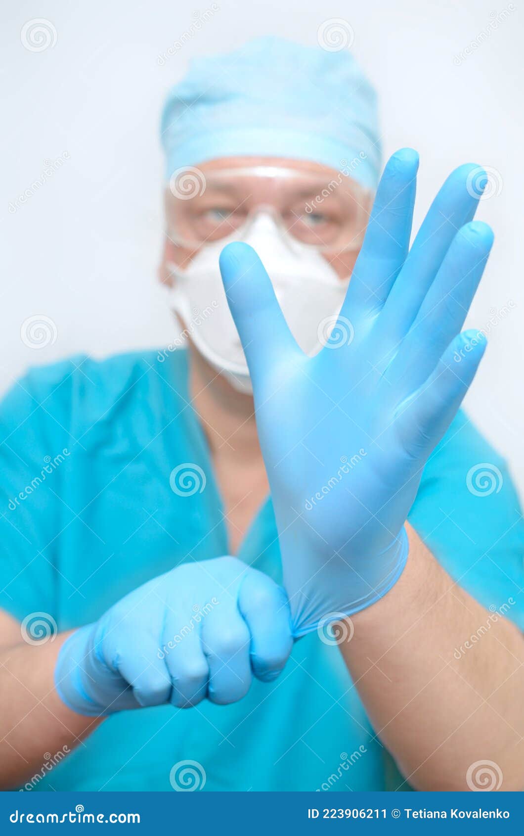 The Doctor Puts on Sterile Gloves. Preparing for Surgery Stock Image
