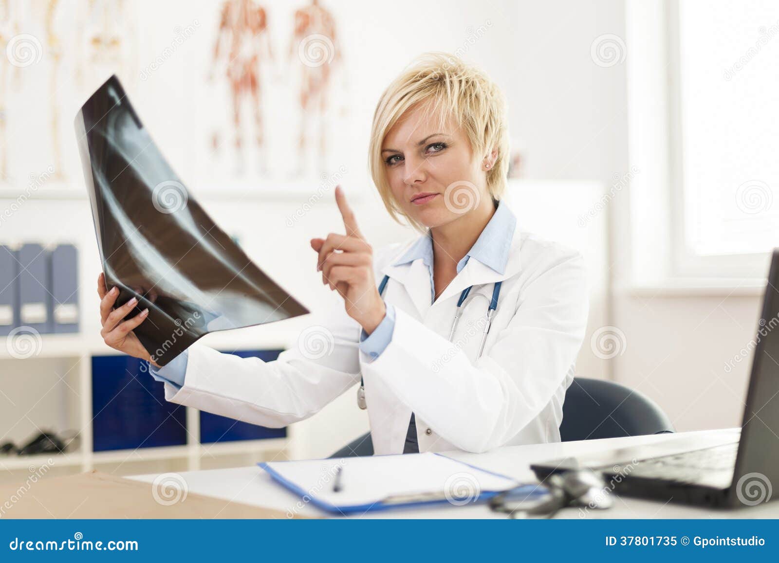 Doctor with xrays stock image. Image of clinic, healthcare 37801735