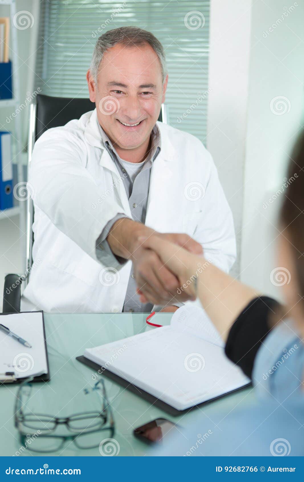 Doctor Shaking Hands with Patient Stock Photo Image of smile, medical