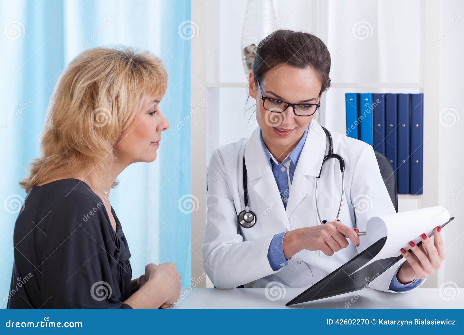 doctor showing patient test results