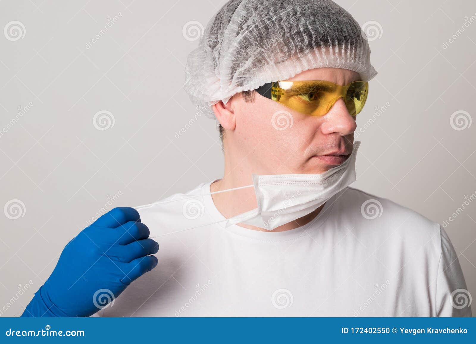 Doctor in a Surgical Mask, Gloves and Glasses. Surgeon before the ...