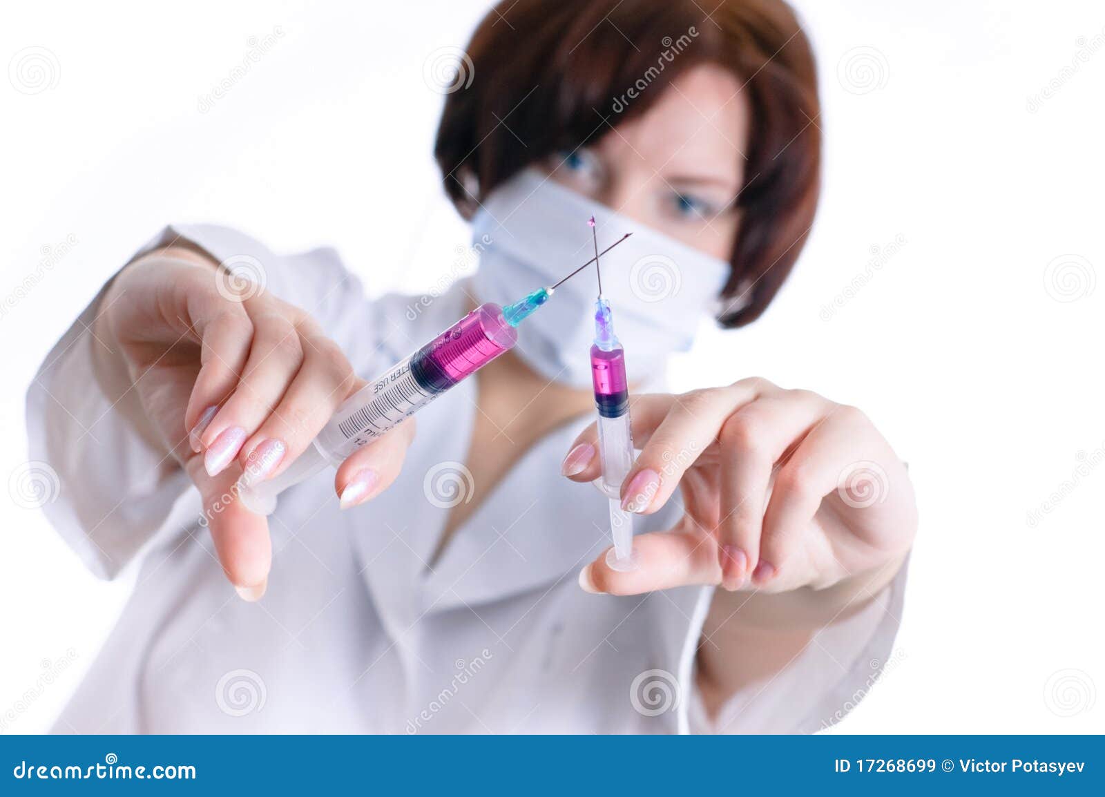 Doctor with syringes stock image. Image of anesthetic 17268699