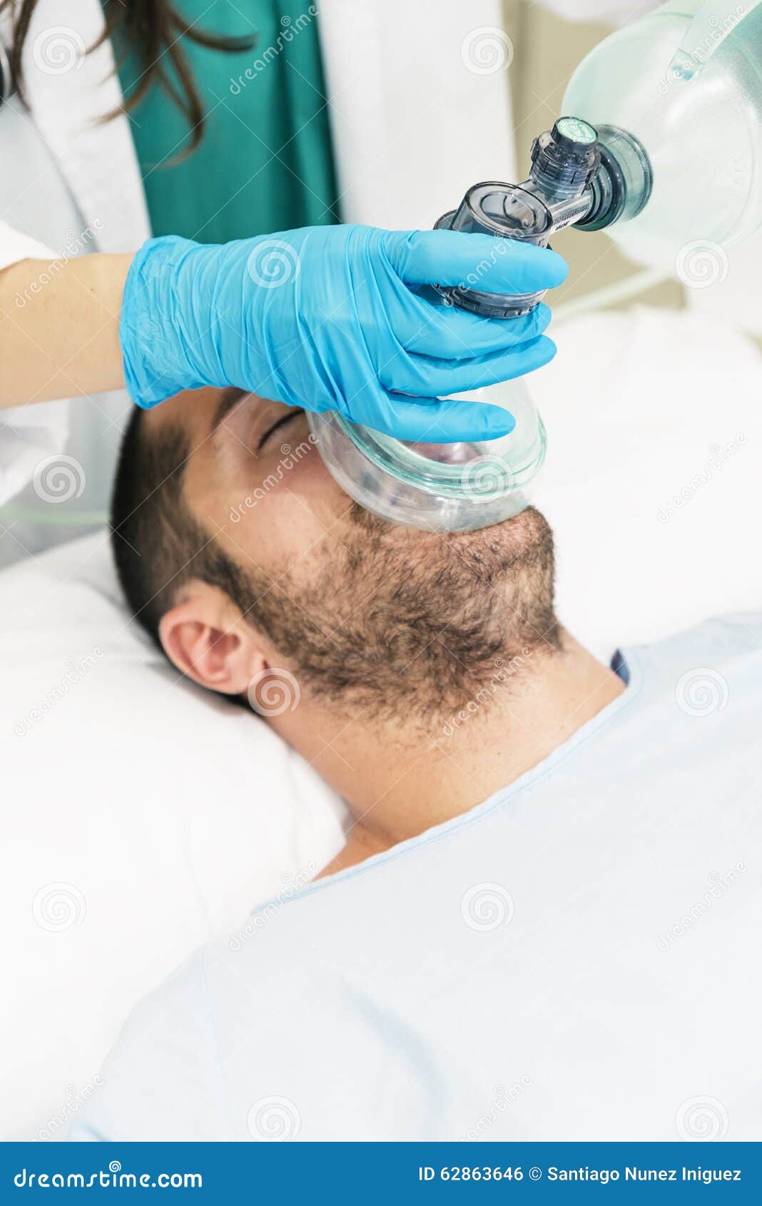 Doctor Using the Ball Resuscitation with a Patient Stock Photo Image