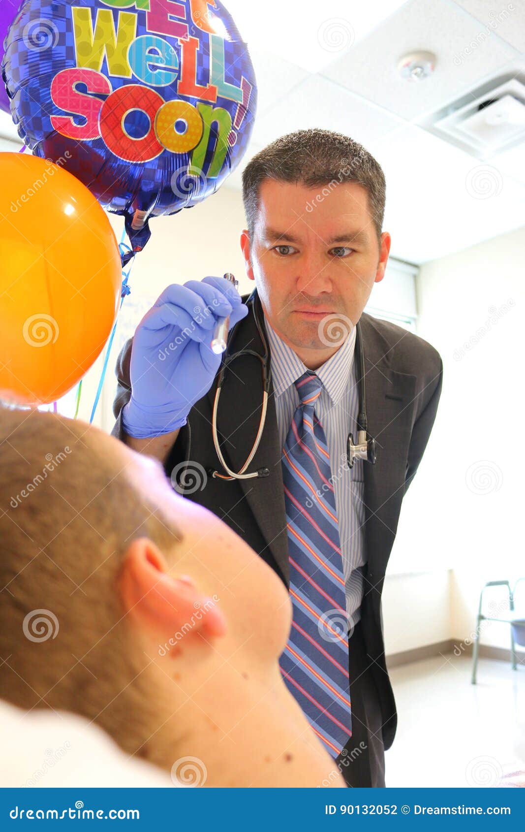 doctor using penlight