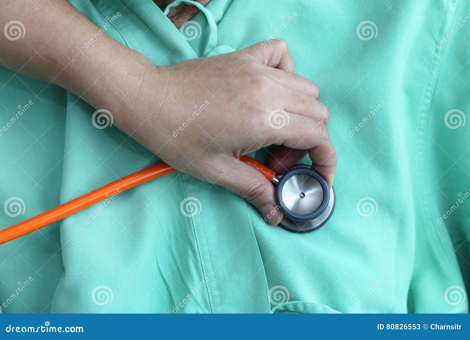 Doctor Using Stethoscope To Listen To Patient Heartbeat Stock Image
