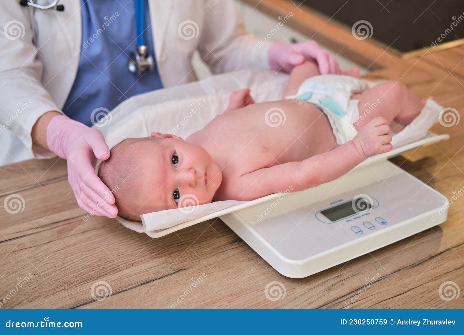 The Doctor Weighs a Newborn Baby on a Scale. Uniformed Nurse Taking  Measurements of the Child Weight Stock Image - Image of illness, pediatric:  230250759