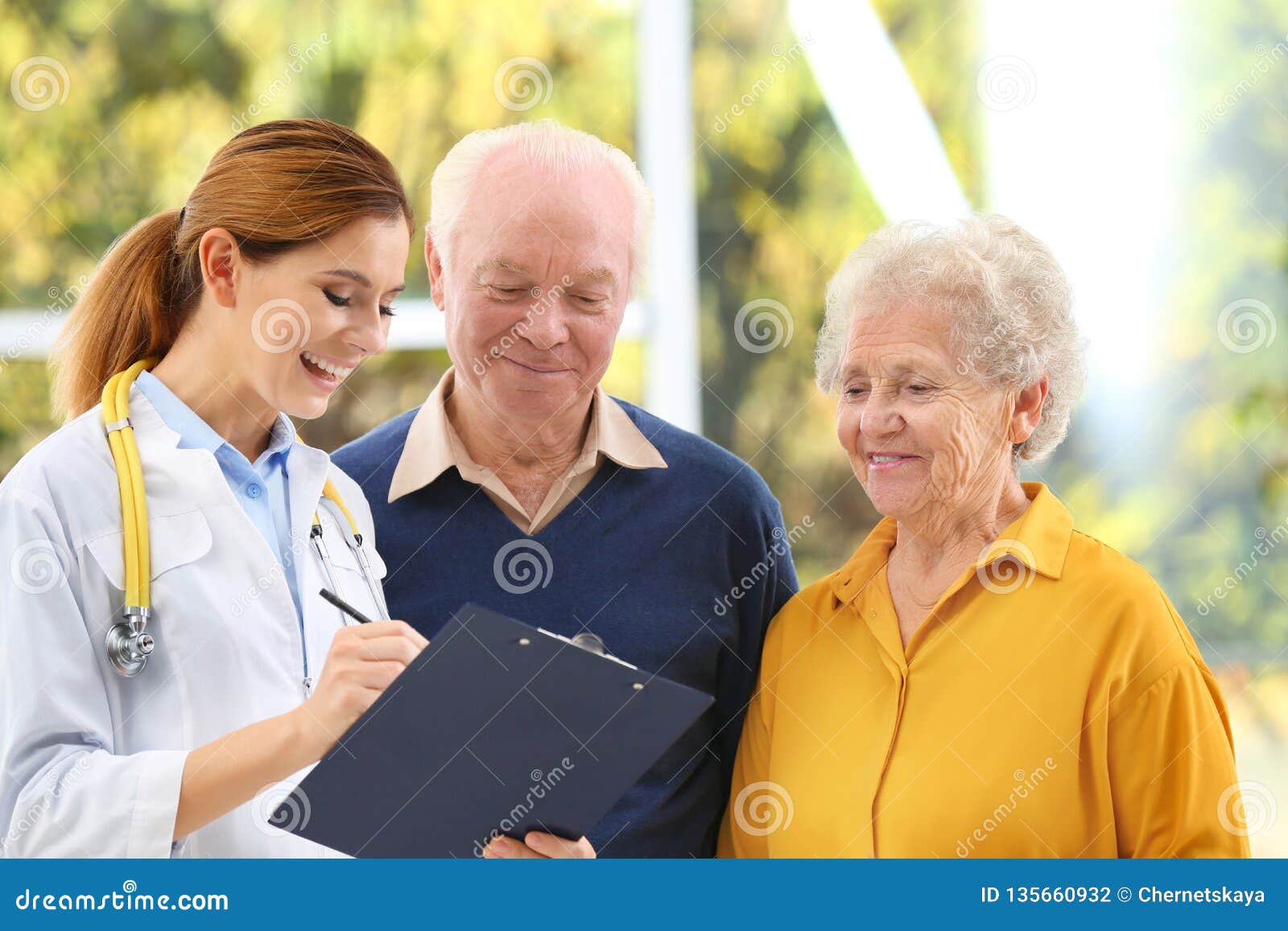 doctor working with elderly patients