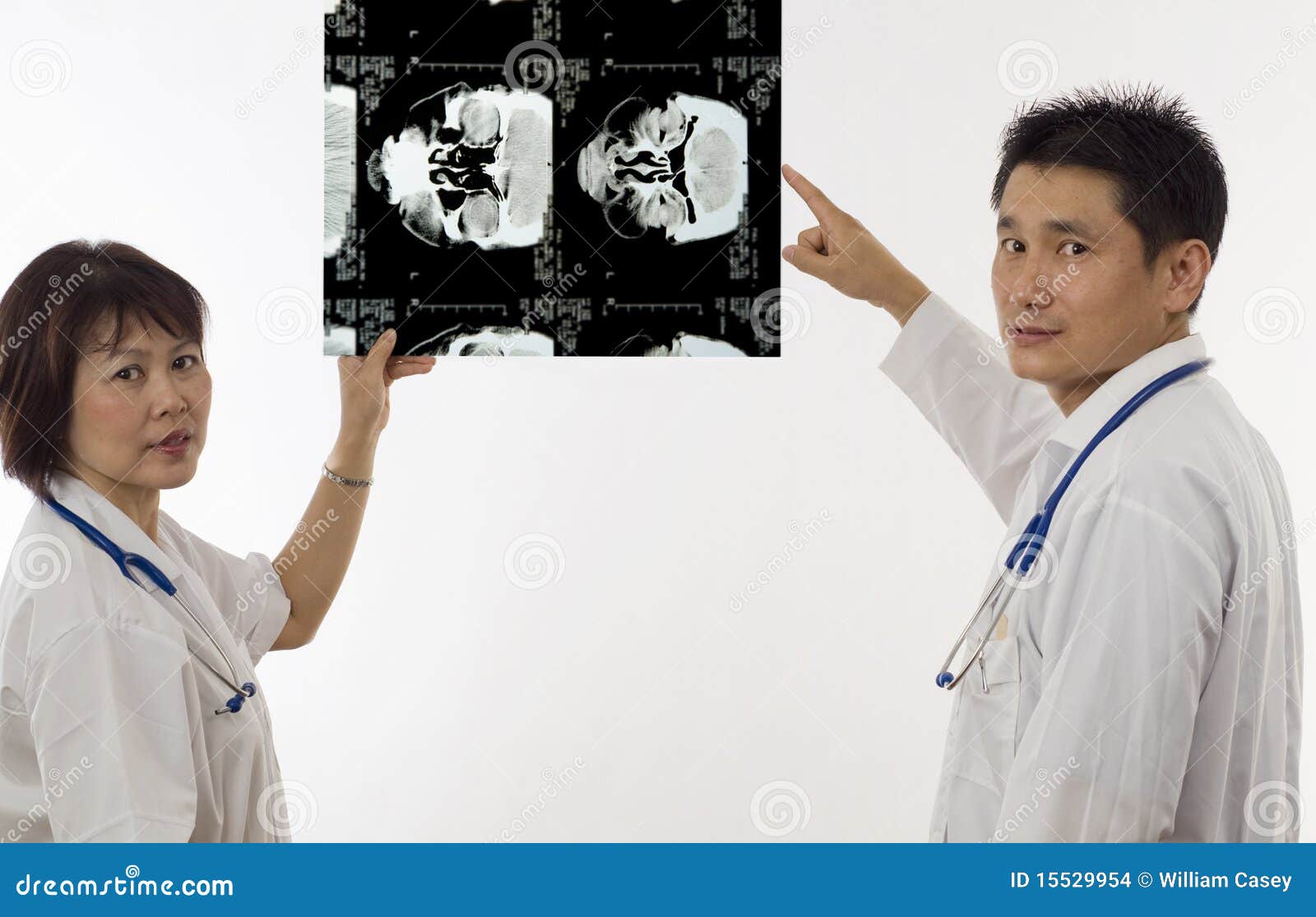 Doctors with MRI scan stock photo. Image of standing 15529954