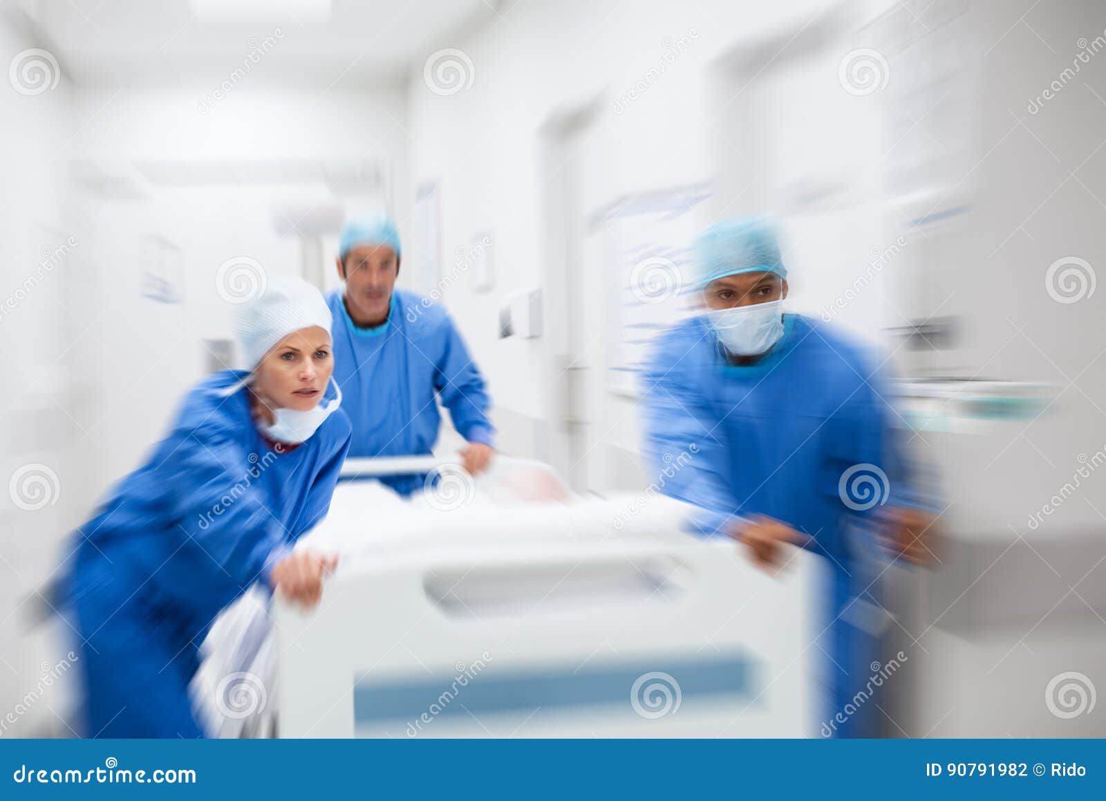 doctors rushing patient to surgery