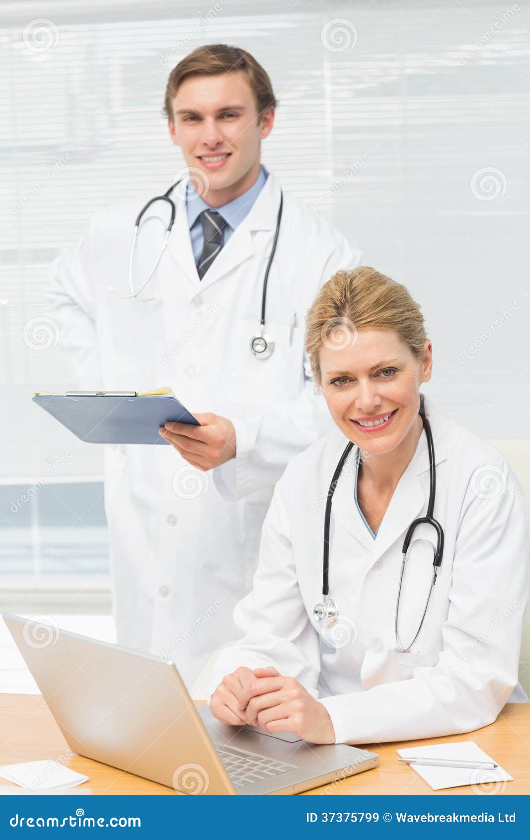 Doctors Smiling at the Camera Together Stock Image Image of camera, working 37375799