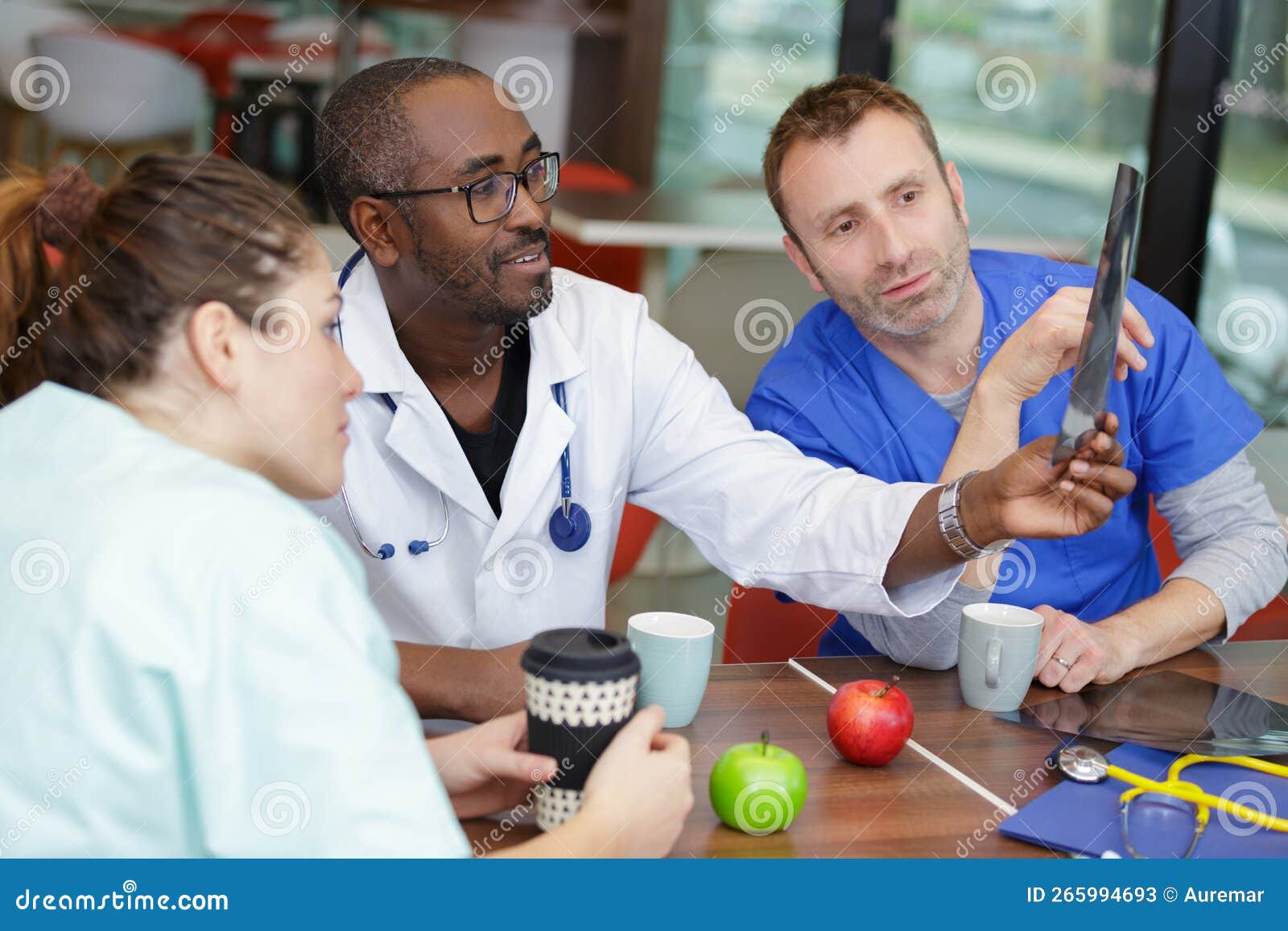 Doctors Team during Lunchbreak in Resting Room Stock Image Image of