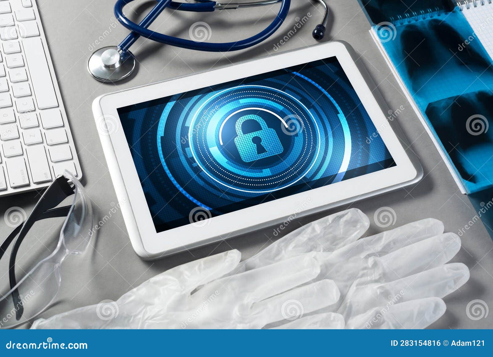  Security and Technology Concept with Tablet Pc on Table Stock Photo