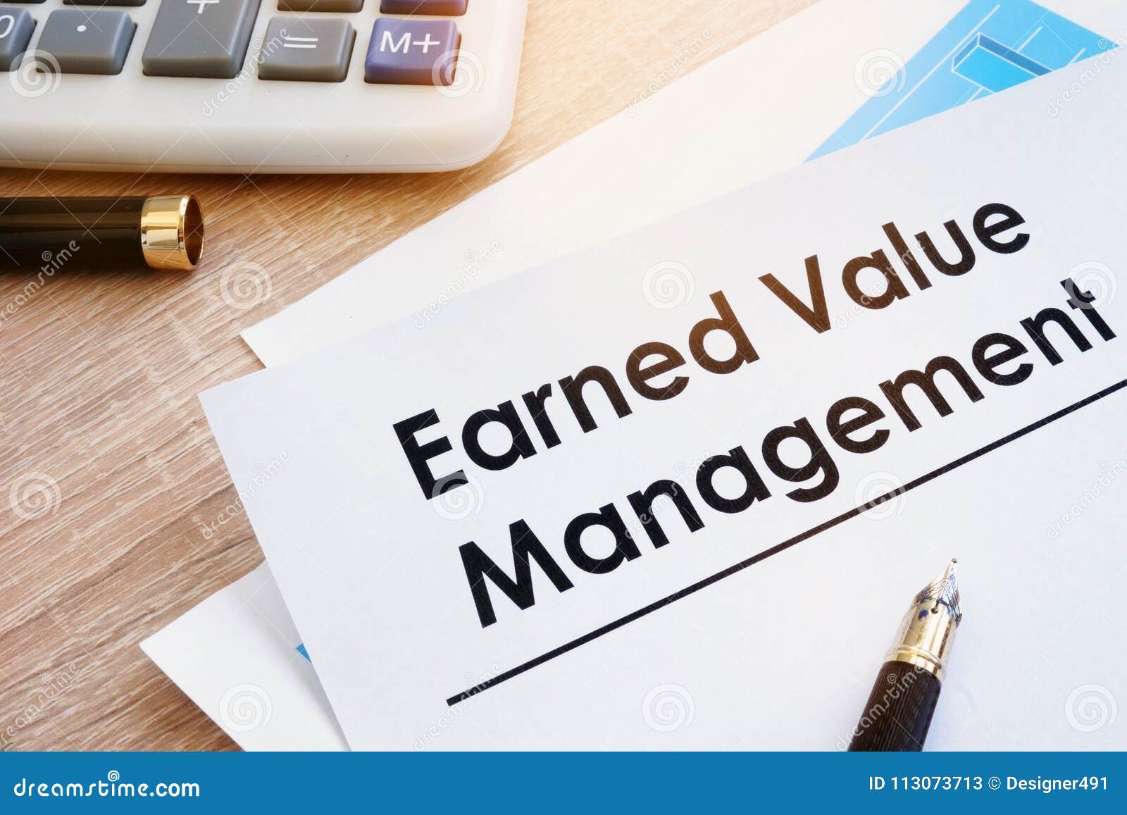 document earned value management on a desk.