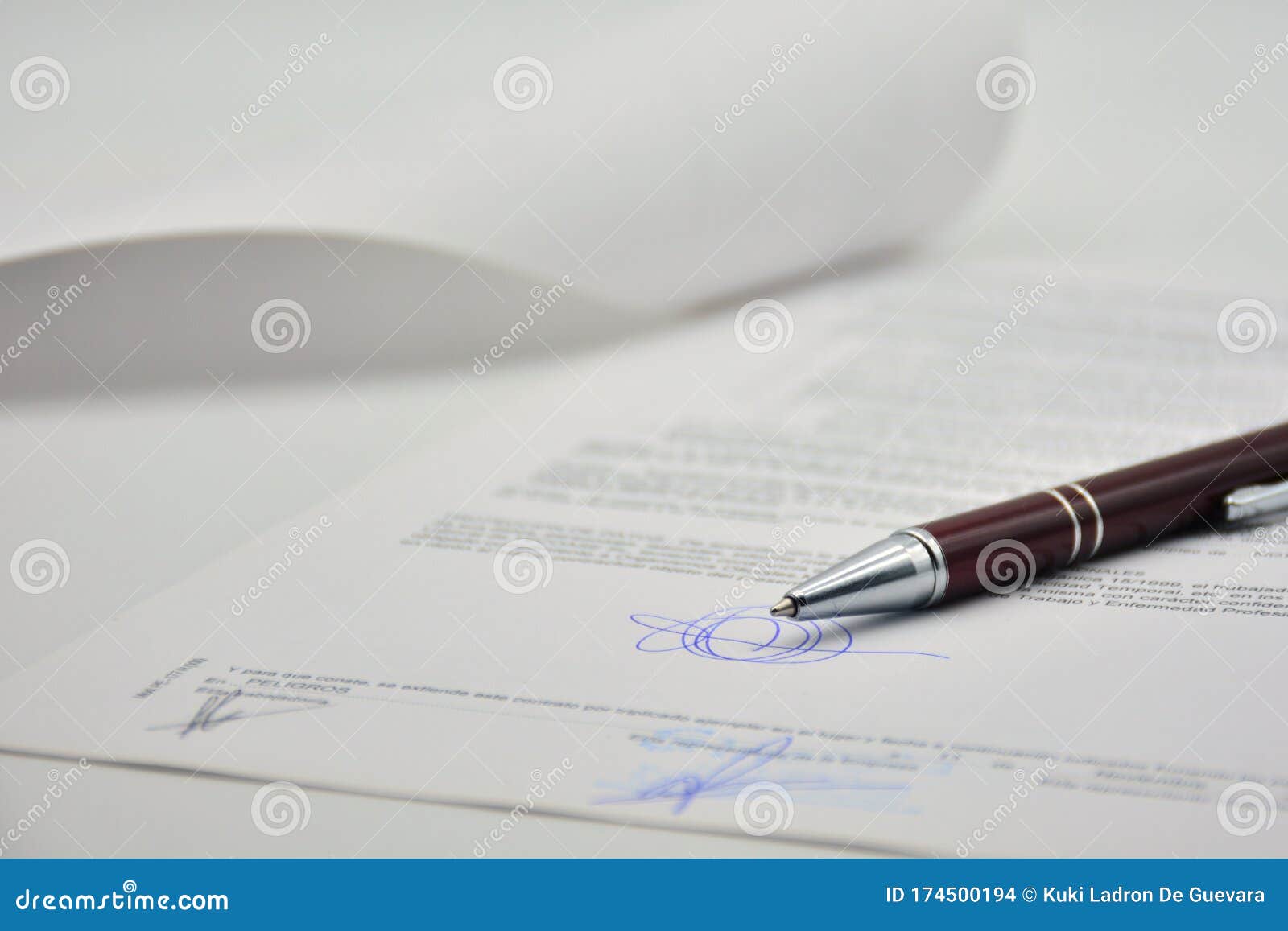 document signed with a pen, contract