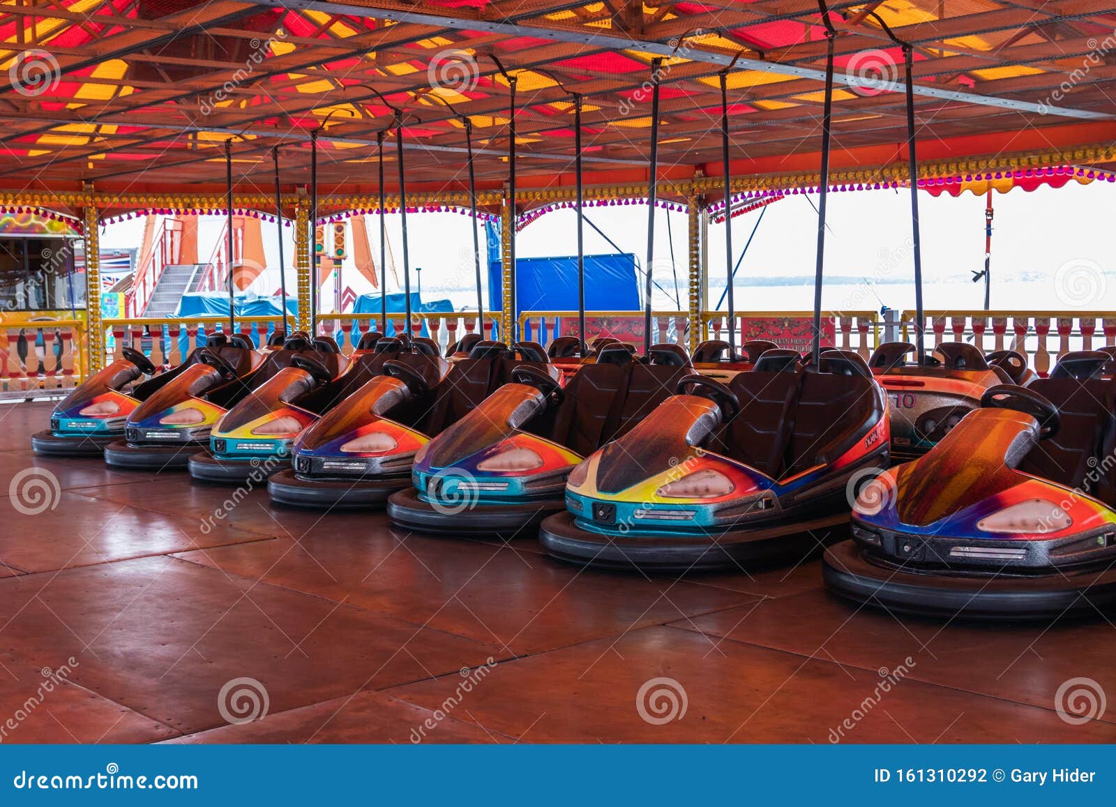 Dodgems or Bumper Cars Lined Up at the Fairground Stock Photo Image