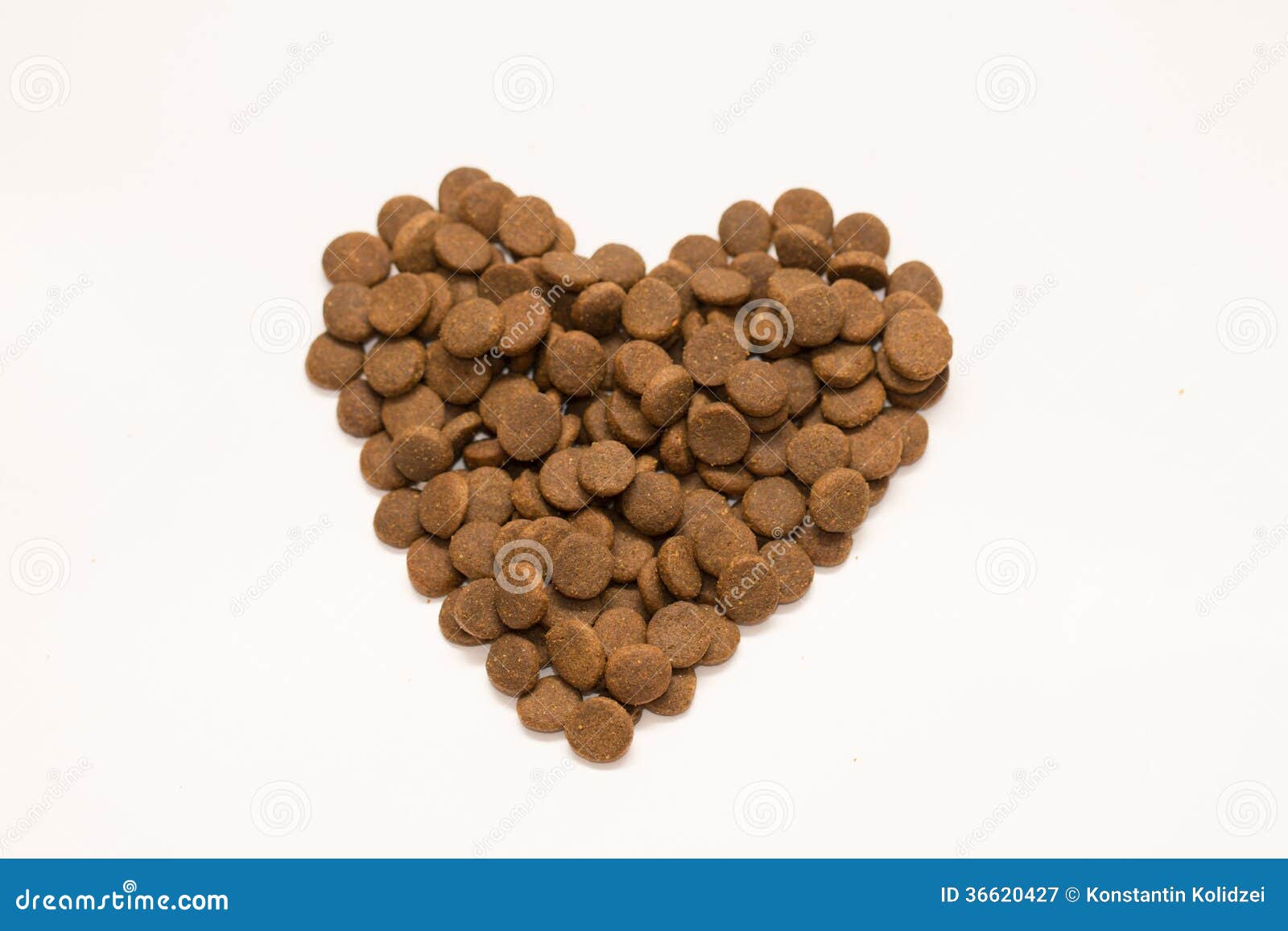 Dog food. The dry dog food isolated on white. Photo taken on: January 10th, 2014