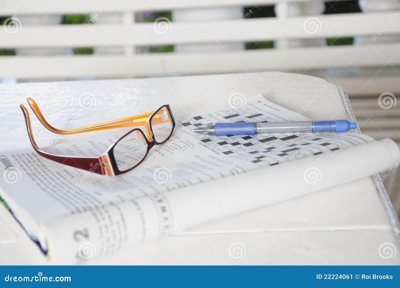 Doing a crossword stock image. Image of glasses, frames 22224061