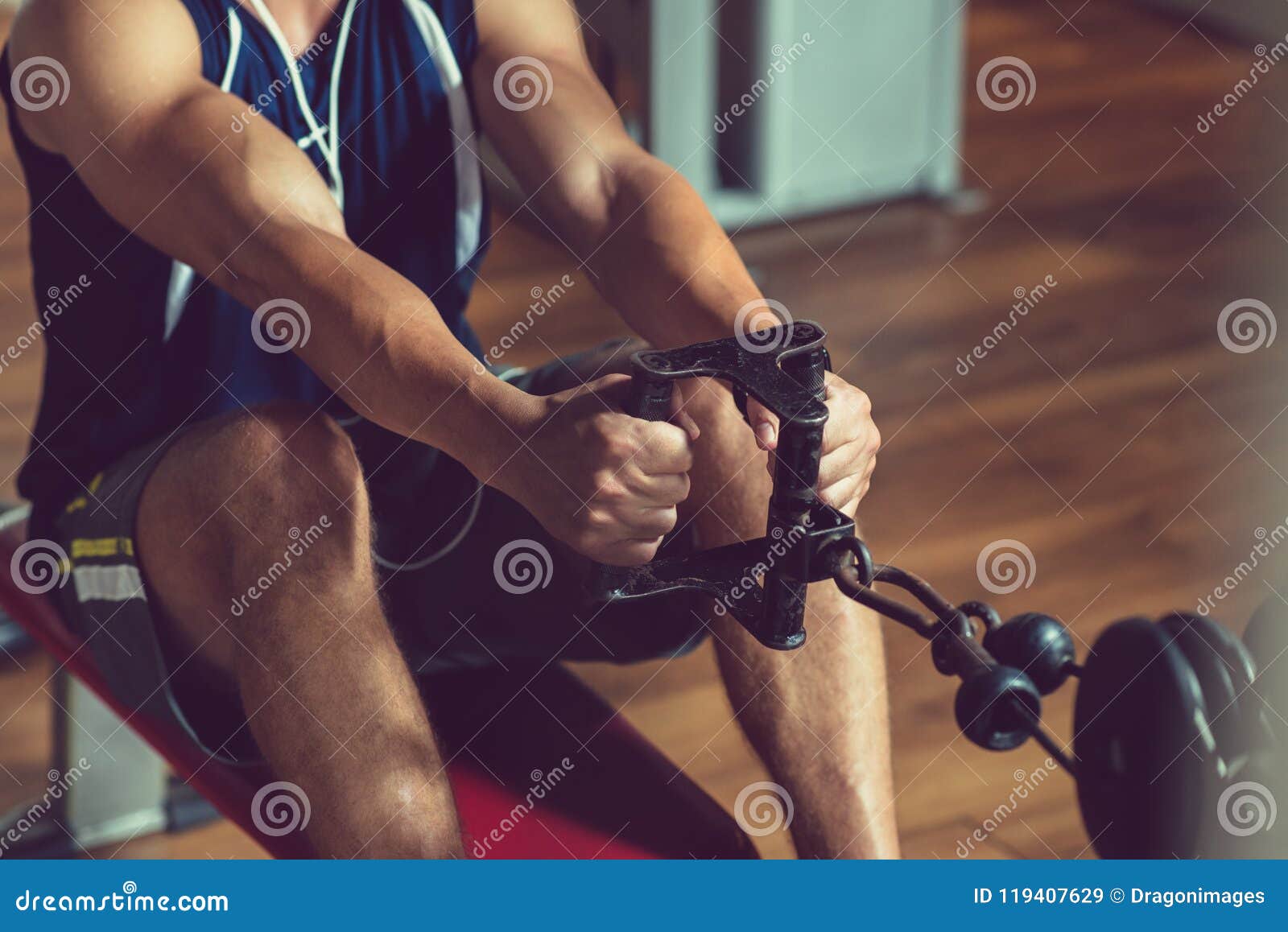 Doing Exercise on Rowing Machine Stock Image Image of muscular
