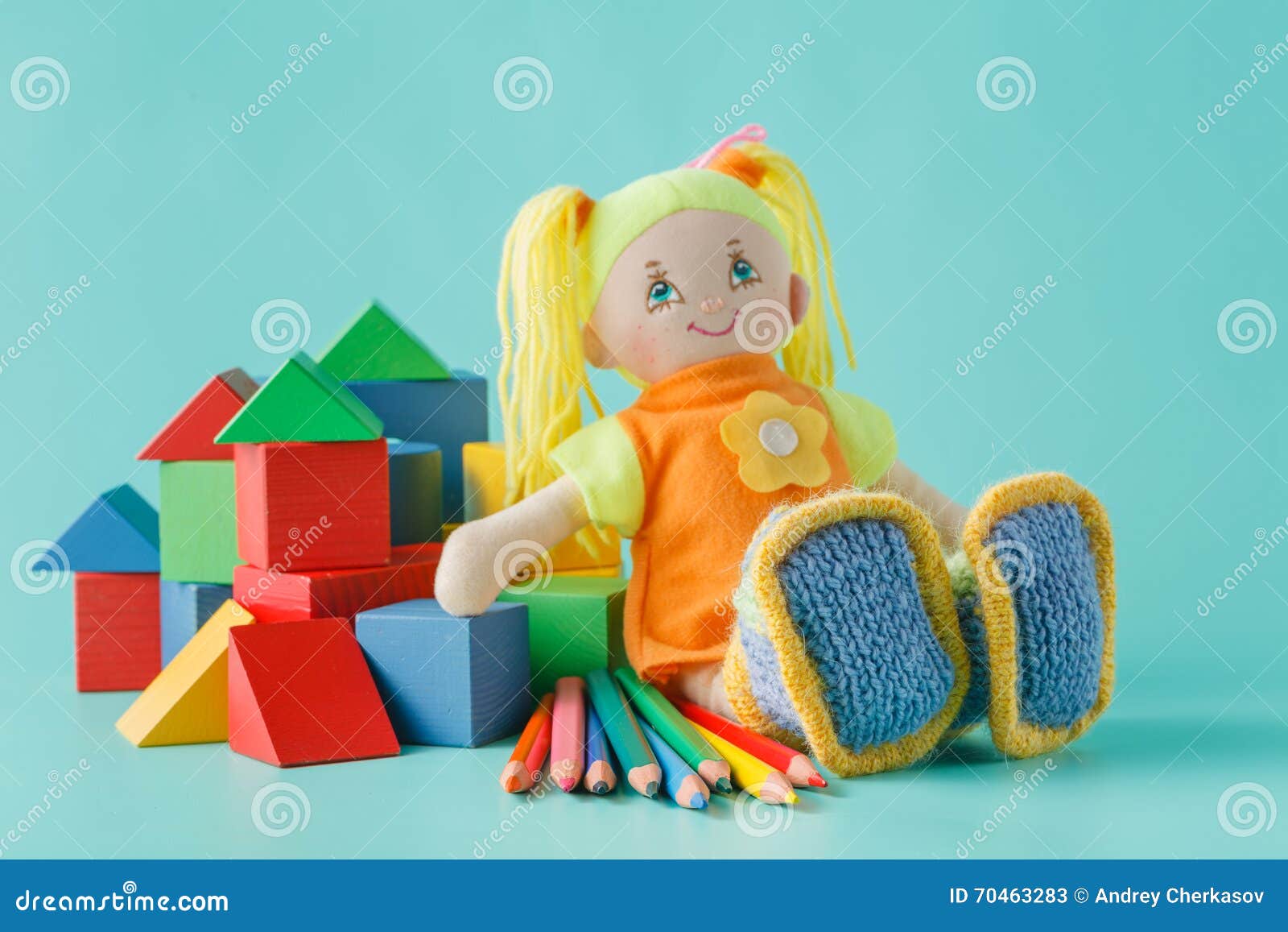 Doll with colored pencils stock image. Image of figurine 70463283