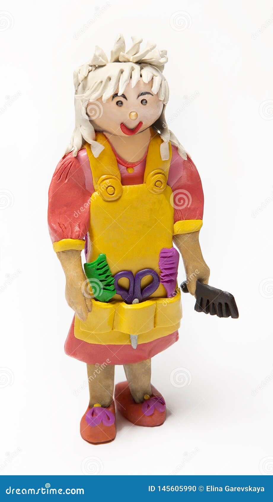 Doll Hairdresser Of Plasticine On A White Background Stock Photo